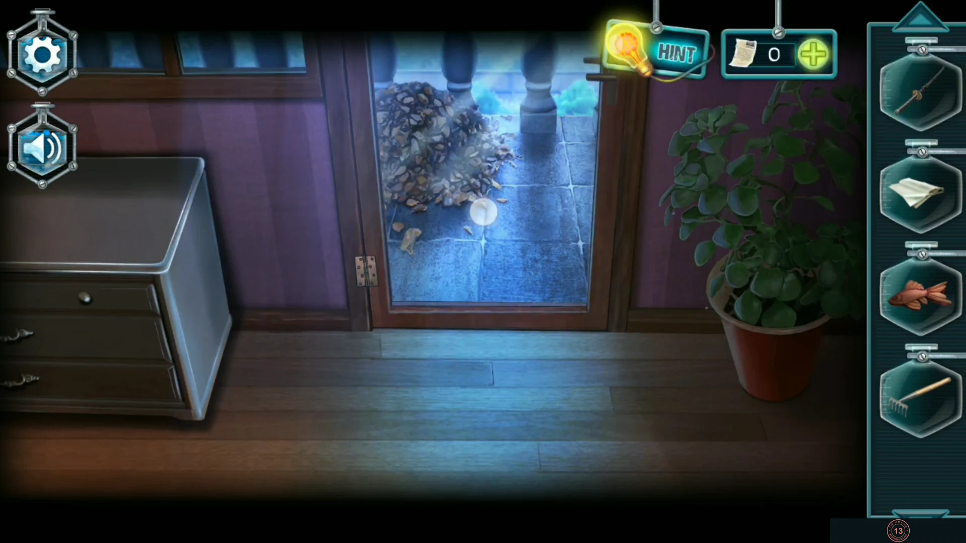 Bedroom corner with the glass balcony door, leaves visible outside, a dresser and a potted plant
