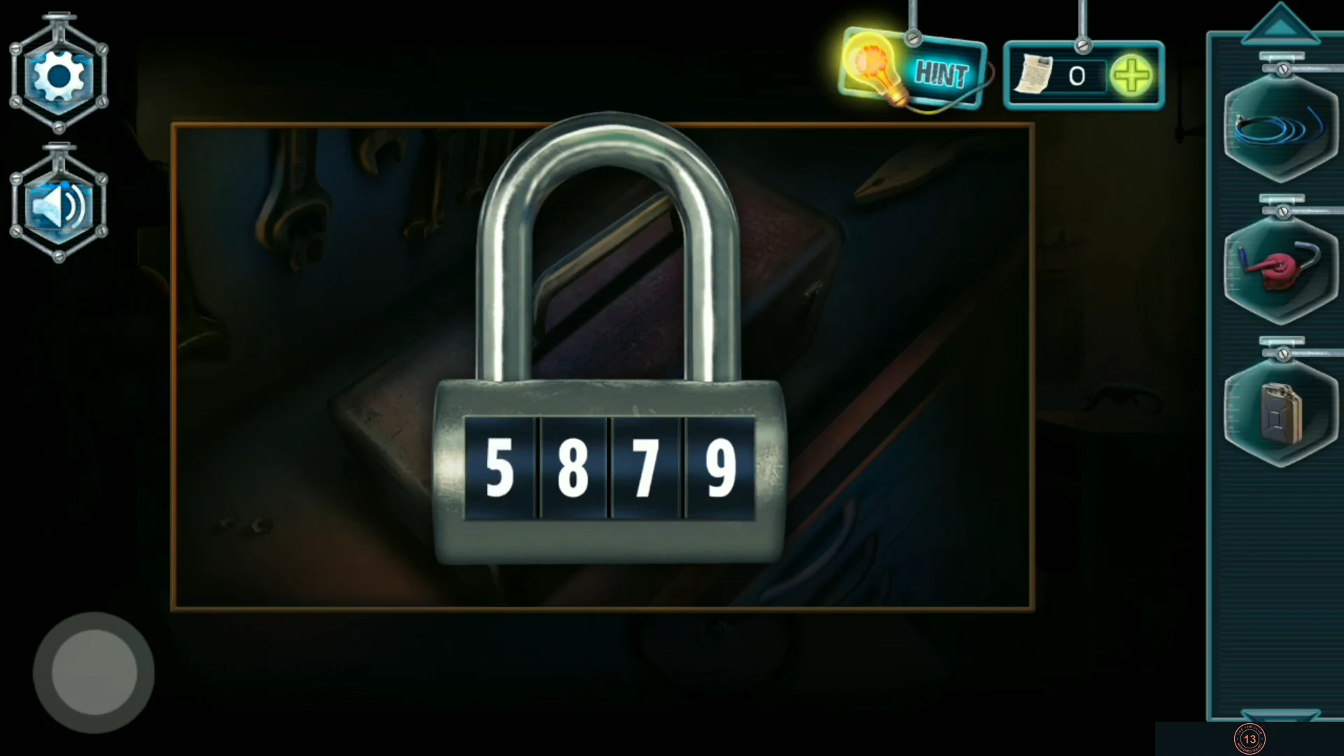 Metal toolbox padlock on the garage workbench with four number wheels