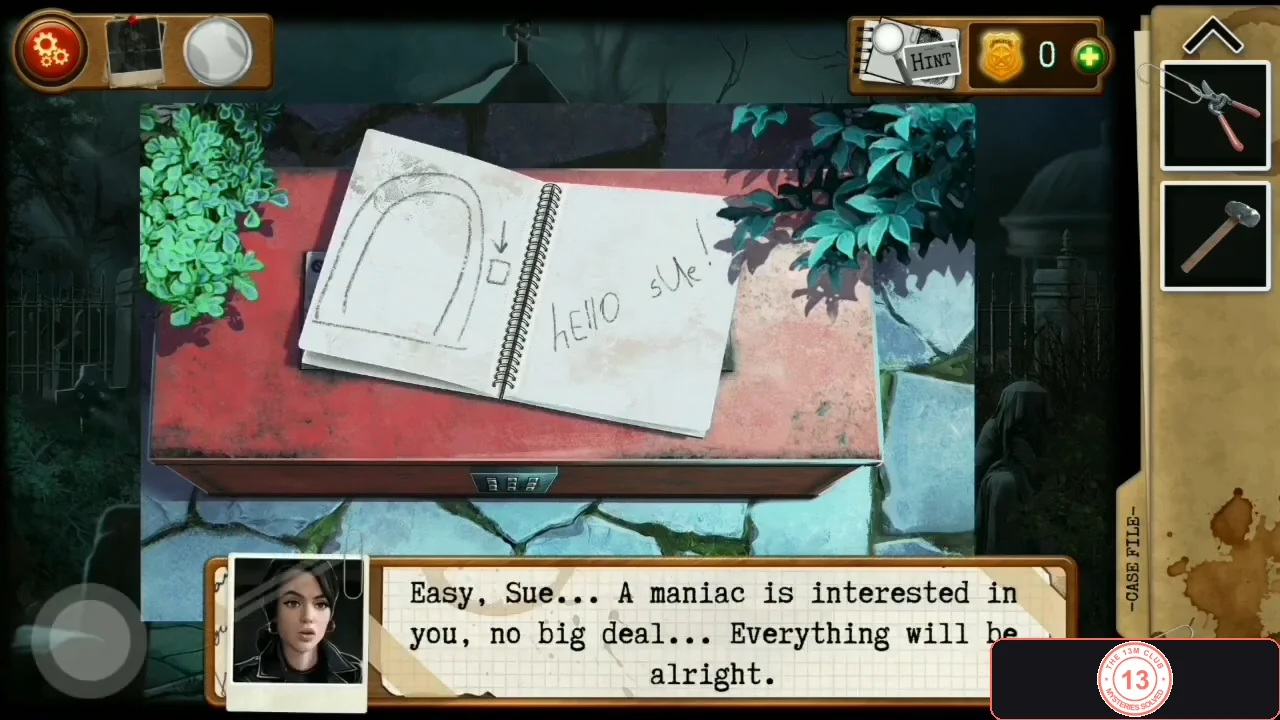 Notebook on the red lockbox showing a sketch of the crypt door with an arrow to a small square right of the door and the words hello sue!