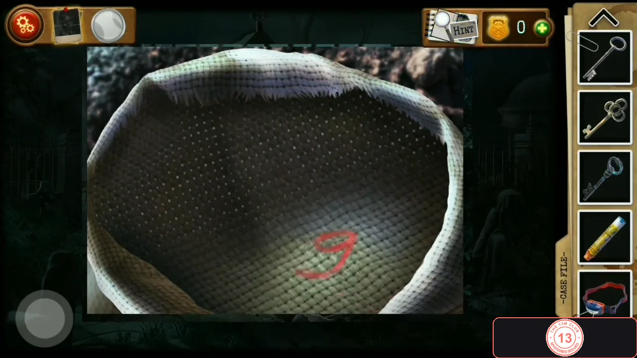 The emptied sack with a red 9 painted on the bottom
