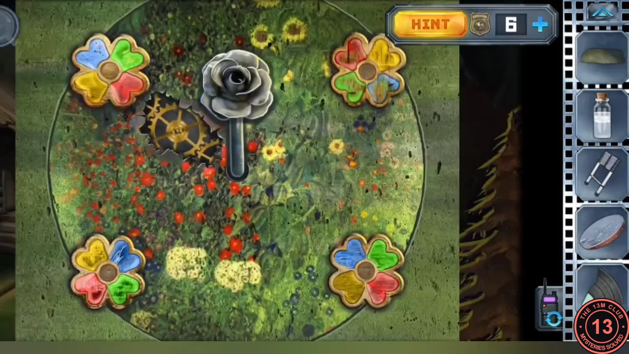The flower lever in the clearing in its starting layout: four four-petal flowers with blue, green, yellow and red petals around the golden gear and the rose lever.