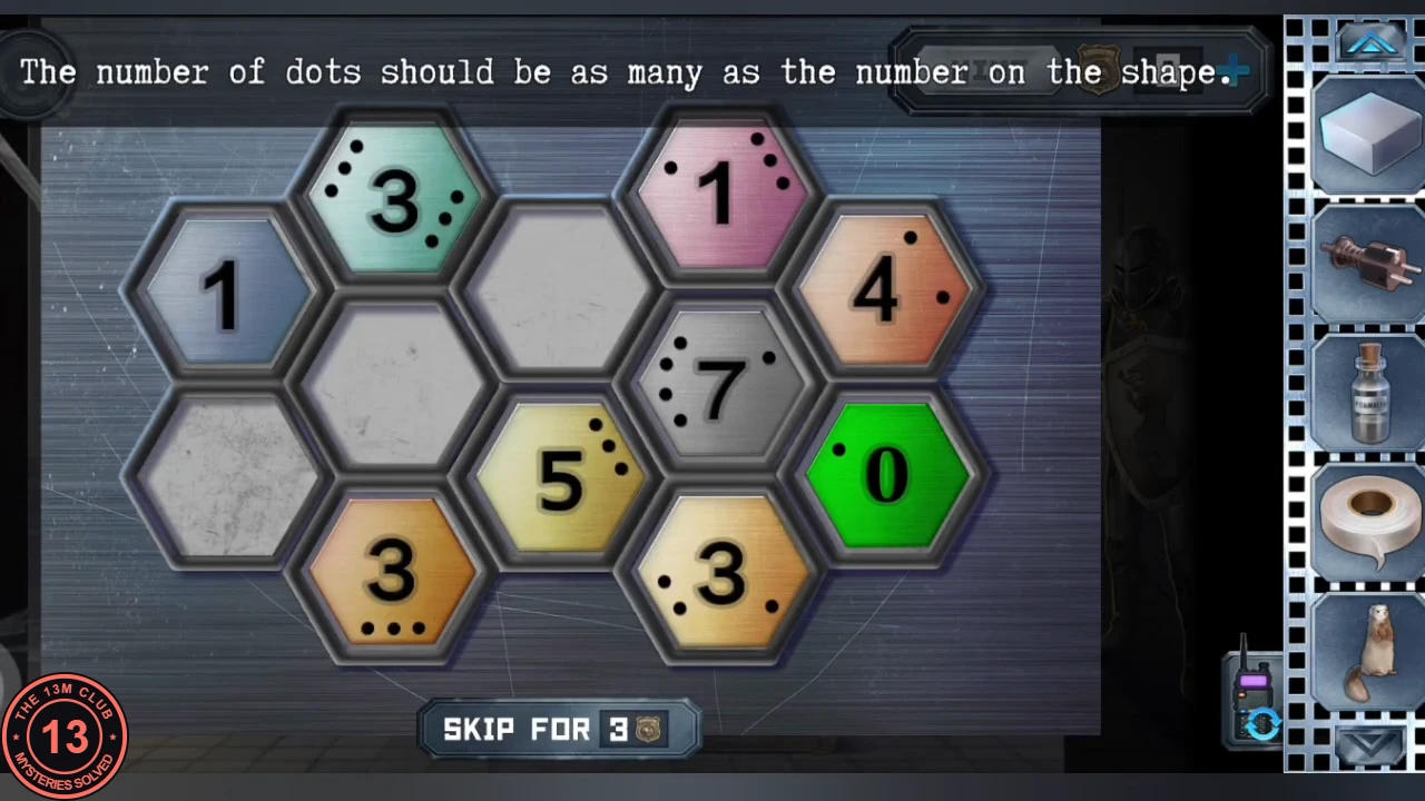 Hexagon panel on the museum shield door: numbered hexagons with black dots on their edges and three blank grey hexagons, only the 0 hexagon green, under the instruction The number of dots should be as many as the number on the shape
