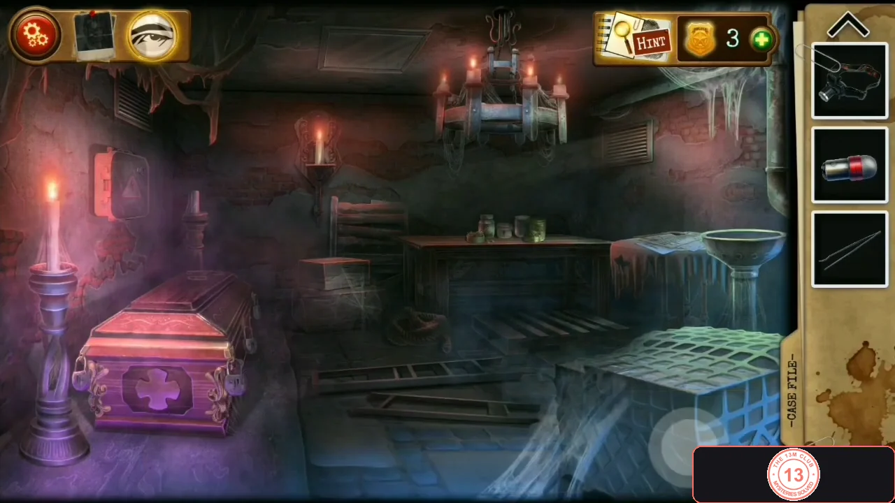 Misty crypt with a purple coffin and a candle in the foreground, a table with jars and papers at the back, a basin on the right and a brick wall