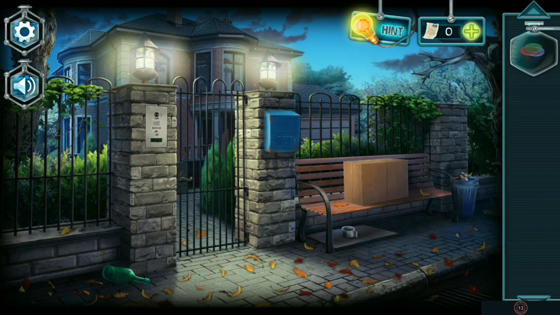 Street outside the mansion gate with the bench, cardboard box, blue mailbox and the intercom on the gate pillar