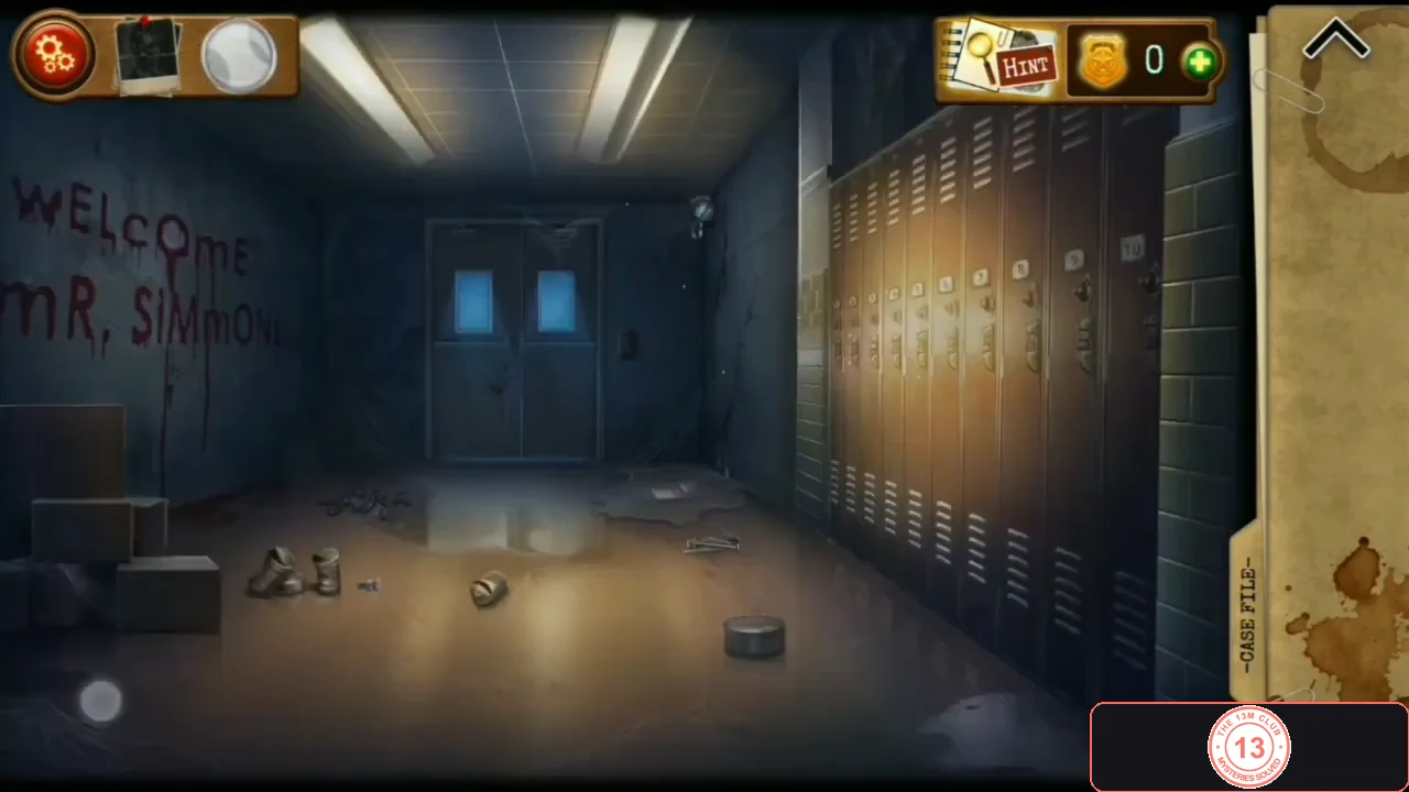 School hallway with WELCOME MR. SIMMONS written in blood on the left wall, a puddle and debris on the floor and lockers on the right