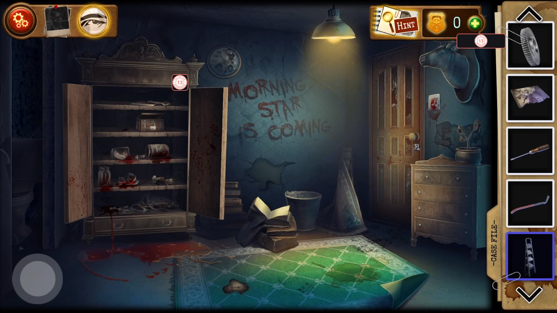 The upstairs room with the pentagram wardrobe standing open and blood stains on the floor in front of it