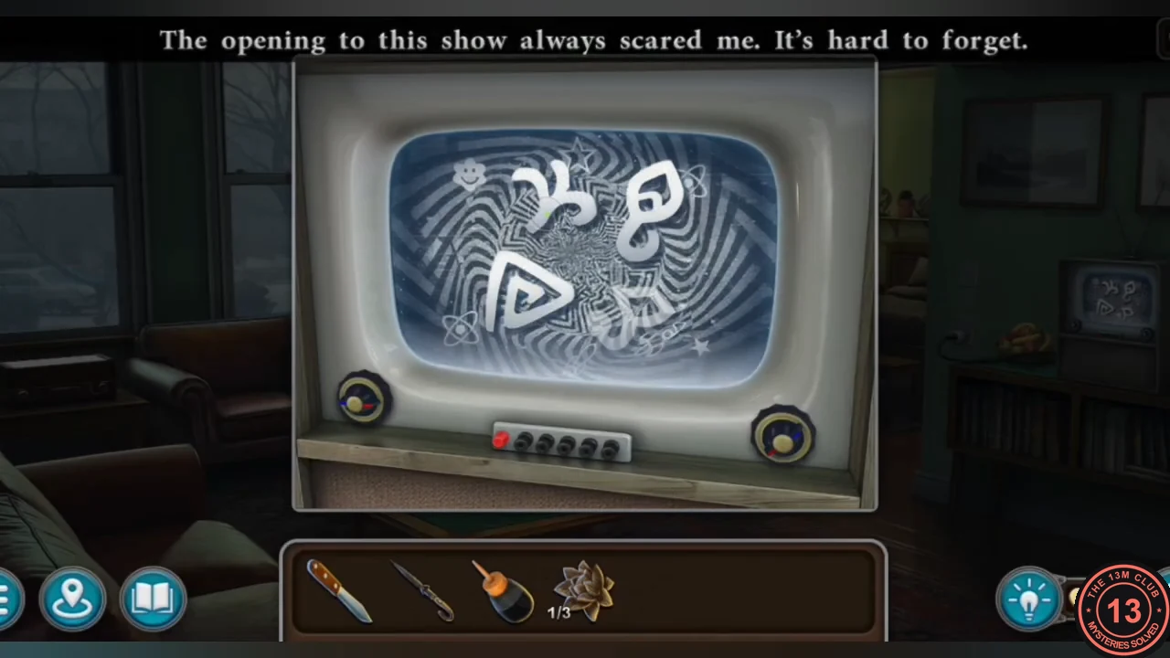 TV screen showing four large symbols during the show opening