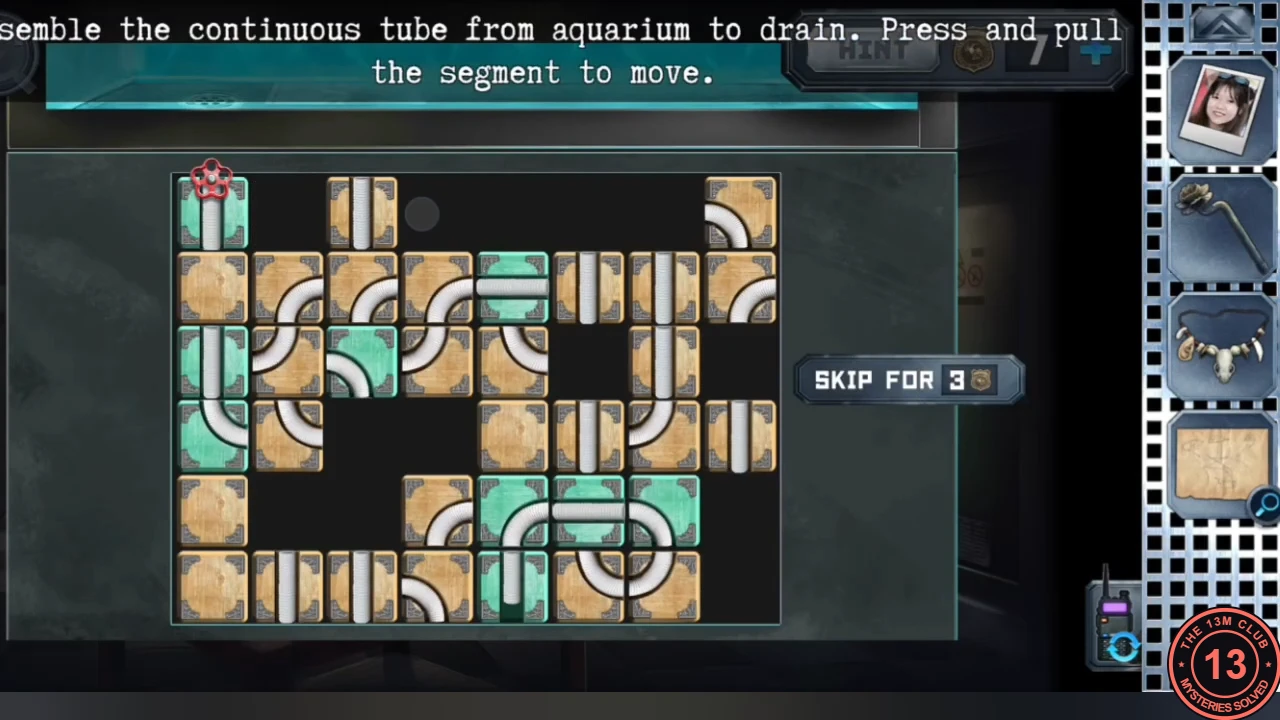 Aquarium tube puzzle: a grid of sliding tiles with white tube pieces, a red valve at the top left and the instruction to assemble a continuous tube from aquarium to drain