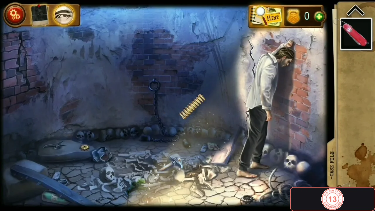 Dark brick cell with Mr. Simmons standing by the right wall, a spring lying in the middle and bones and skulls on the floor