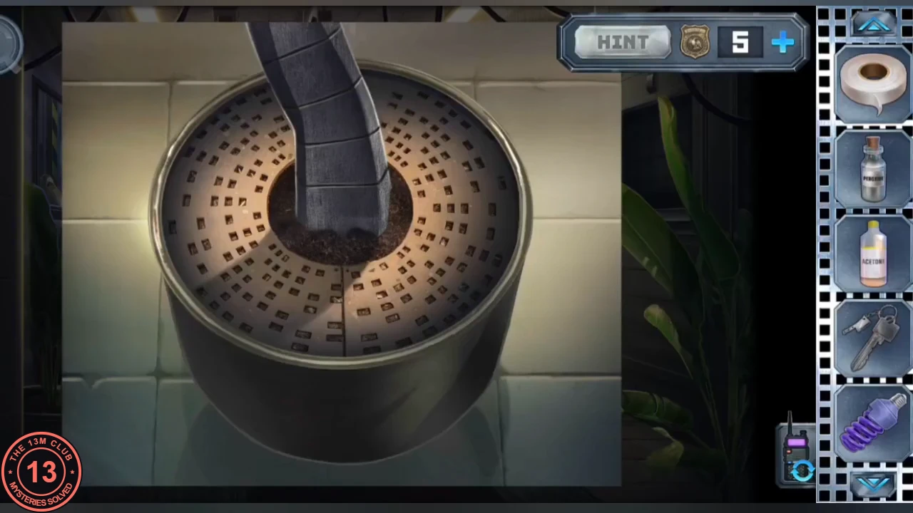 The flower pot seen from above: soil and a bare metal stem, nothing poured yet