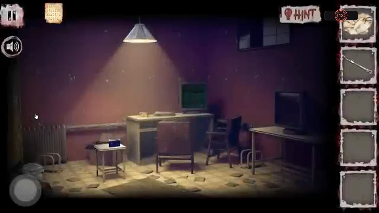 Surgical room with a lamp over a desk, monitors, a small stool-table and a radiator