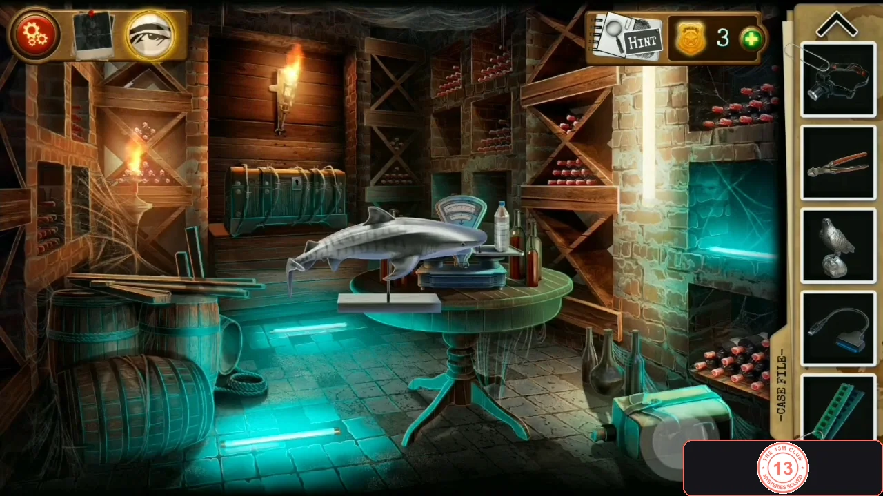Wine cellar with wine racks, barrels on the left, a wooden chest on a shelf at the back and a shark figurine and a scale on the round table in the middle