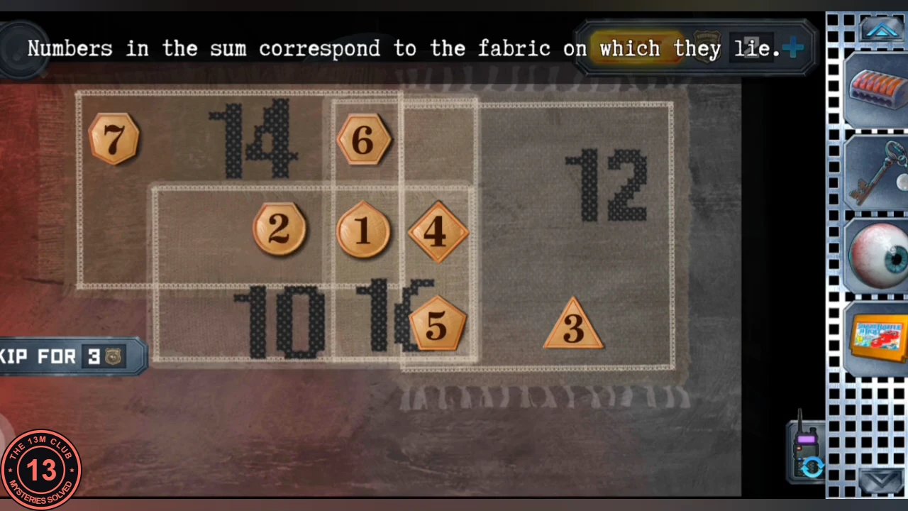 The fabric puzzle with tiles placed: 7 top left, 6 top centre, 2, 1 and 4 across the middle, 5 beside the 16 label and 3 on the right