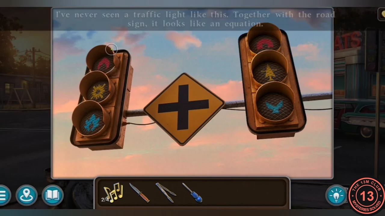 Two traffic lights with symbols in their lamps and a cross-shaped road sign between them