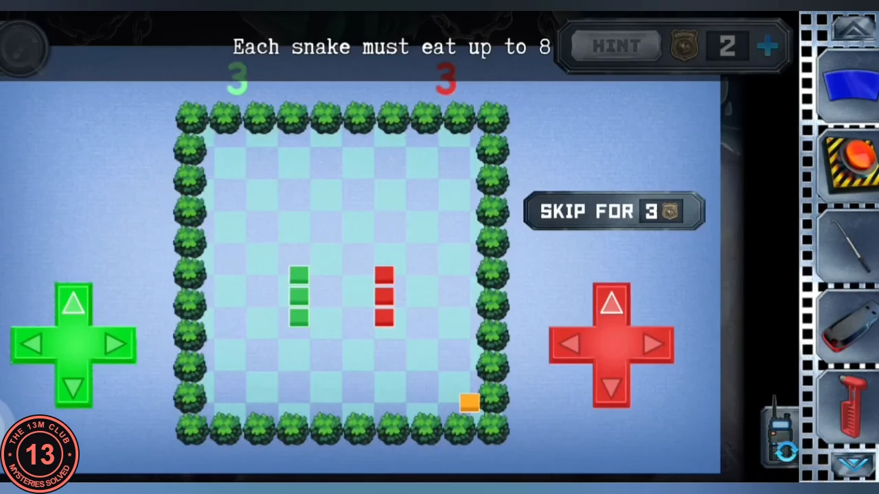 Snake game on the laptop: a hedge-bordered field with a short green snake and a short red snake, an orange food square, a green direction pad at left and a red pad at right, instruction 'Each snake must eat up to 8'