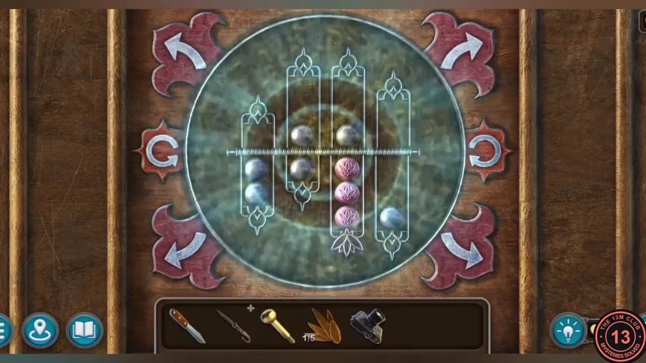 Lotus tube puzzle with the three pink balls together in one tube