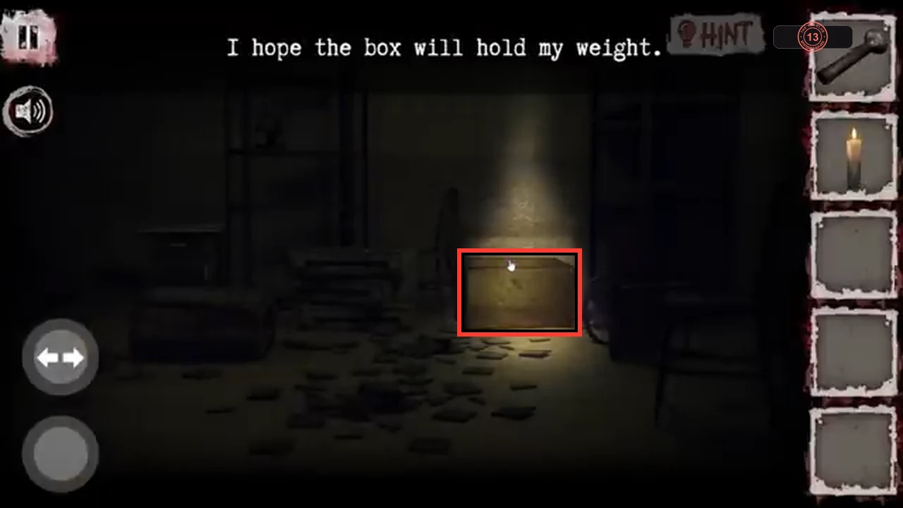 Candle-lit basement with the wooden box placed in front of the tall shelves, marked