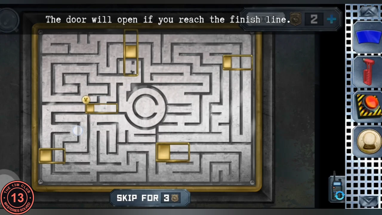 Silver maze lock on the basement door with five gold sliding blocks, a round gold token at the left and a circular finish in the centre, under the text 'The door will open if you reach the finish line.'