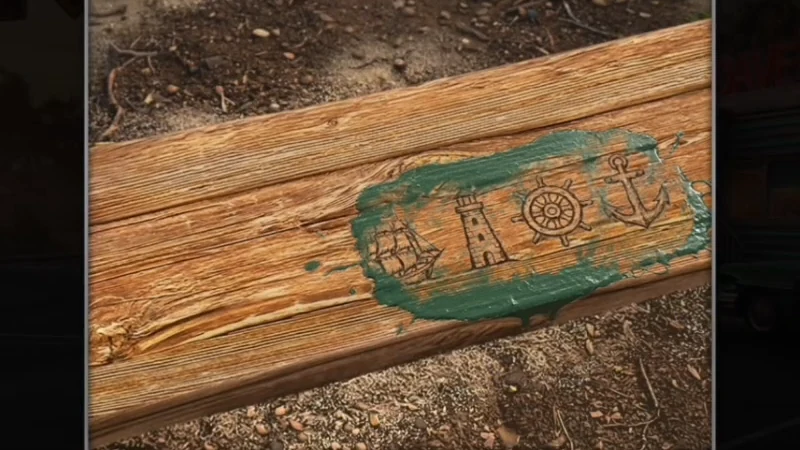 Cleaned wooden swing seat showing four small symbols: a ship, a lighthouse, a ship's wheel and an anchor