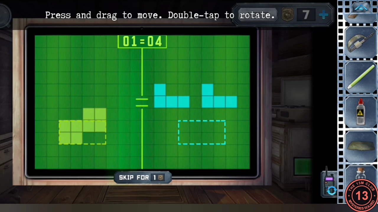 Green cabin monitor showing round 01 of 04 with green pieces and a dashed outline on the left and cyan shapes with a dashed outline on the right
