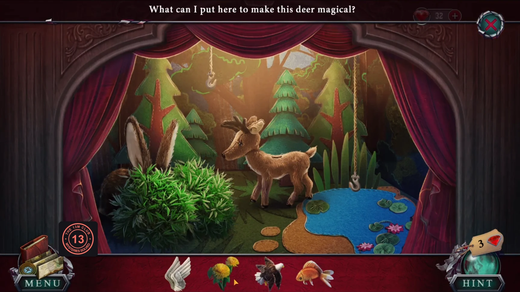 First puppet theatre stage with a forest, a deer and a pond, and puppets in the tray
