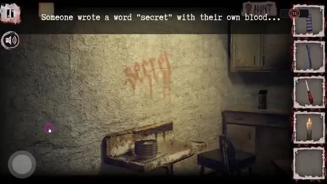 Kitchen wall with the word secret written in blood above a counter