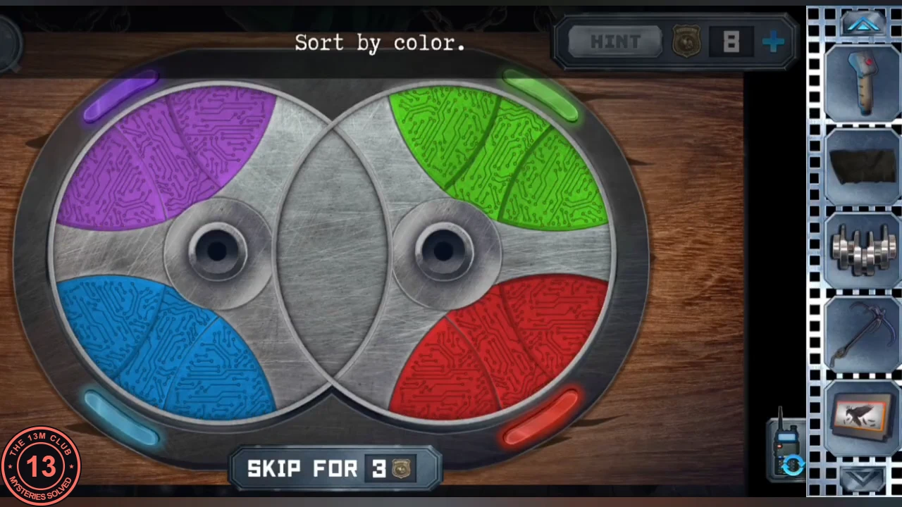 The two wheels sorted: purple segments top left and blue bottom left on the left wheel, green top right and red bottom right on the right wheel, the shared middle empty, with matching coloured lights at each corner