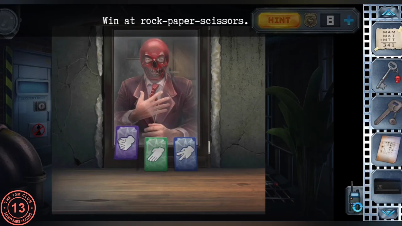 Red-masked man in a suit behind a glass window with three cards in front of him (rock, paper, scissors) and the instruction 'Win at rock-paper-scissors.'
