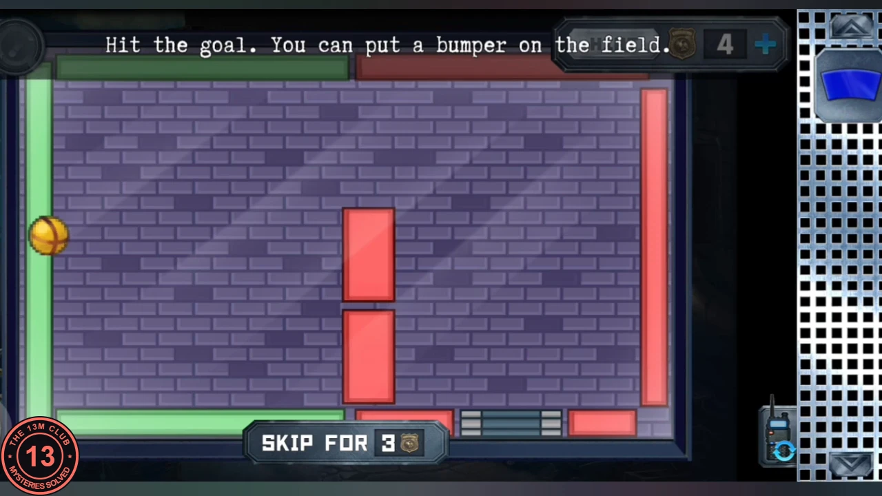 Goal bumper game on the alley television: a ball on the left edge of a purple brick field, two red blocks in the middle, green and red walls and the goal slot at the bottom, with the instruction 'Hit the goal. You can put a bumper on the field.'