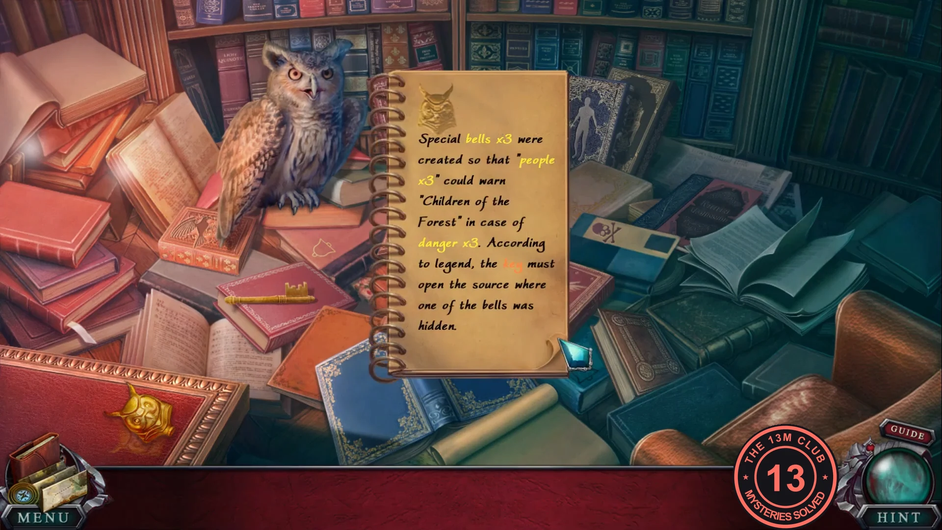 Tina's notes on the pile of books beside the owl statue