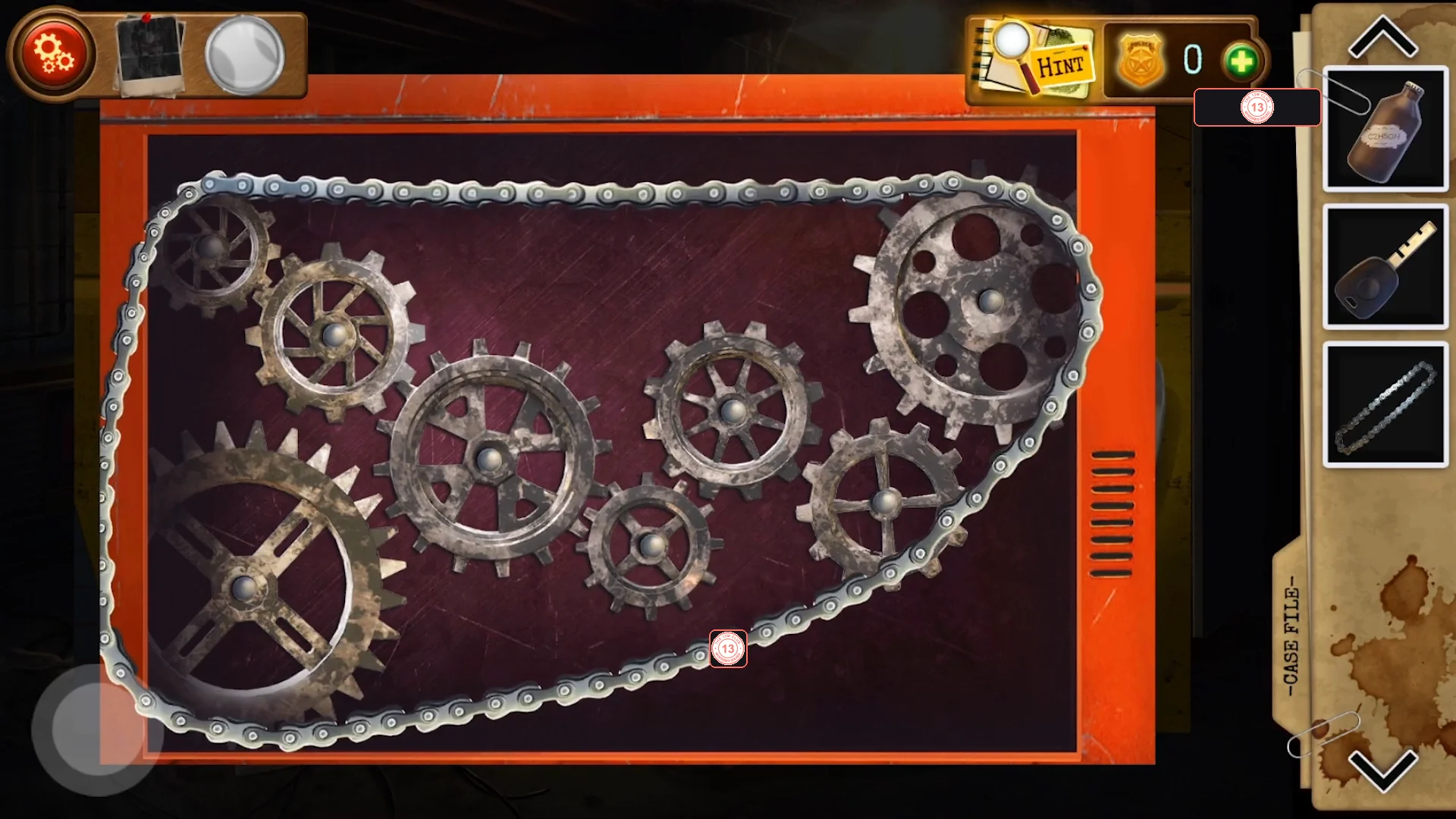 Gear compartment with all gears meshing and the bicycle chain looped around the sprockets
