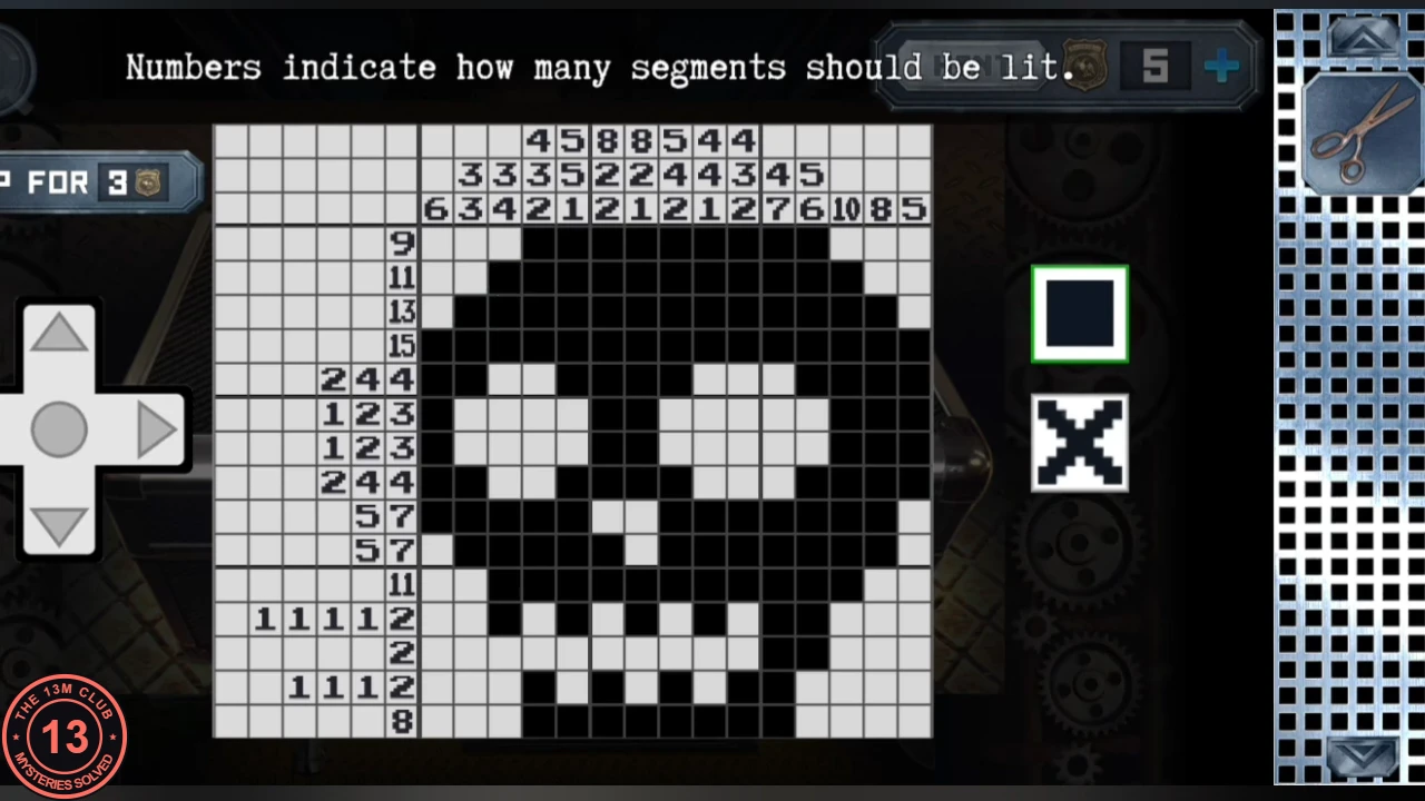 The picture-logic grid completed: filled black cells form a skull with two eye sockets, a nose and teeth