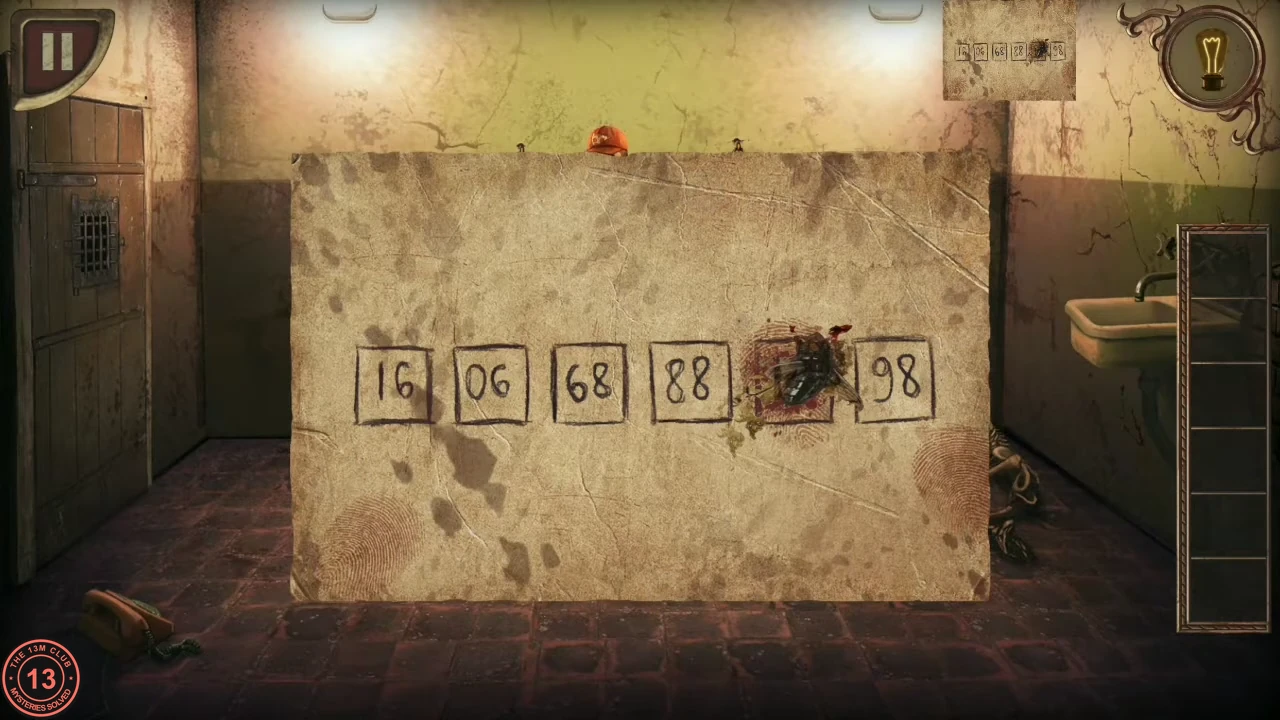 The prisoner's note with boxes 16, 06, 68, 88, a squashed fly and 98, and the phone on the floor at the bottom left.