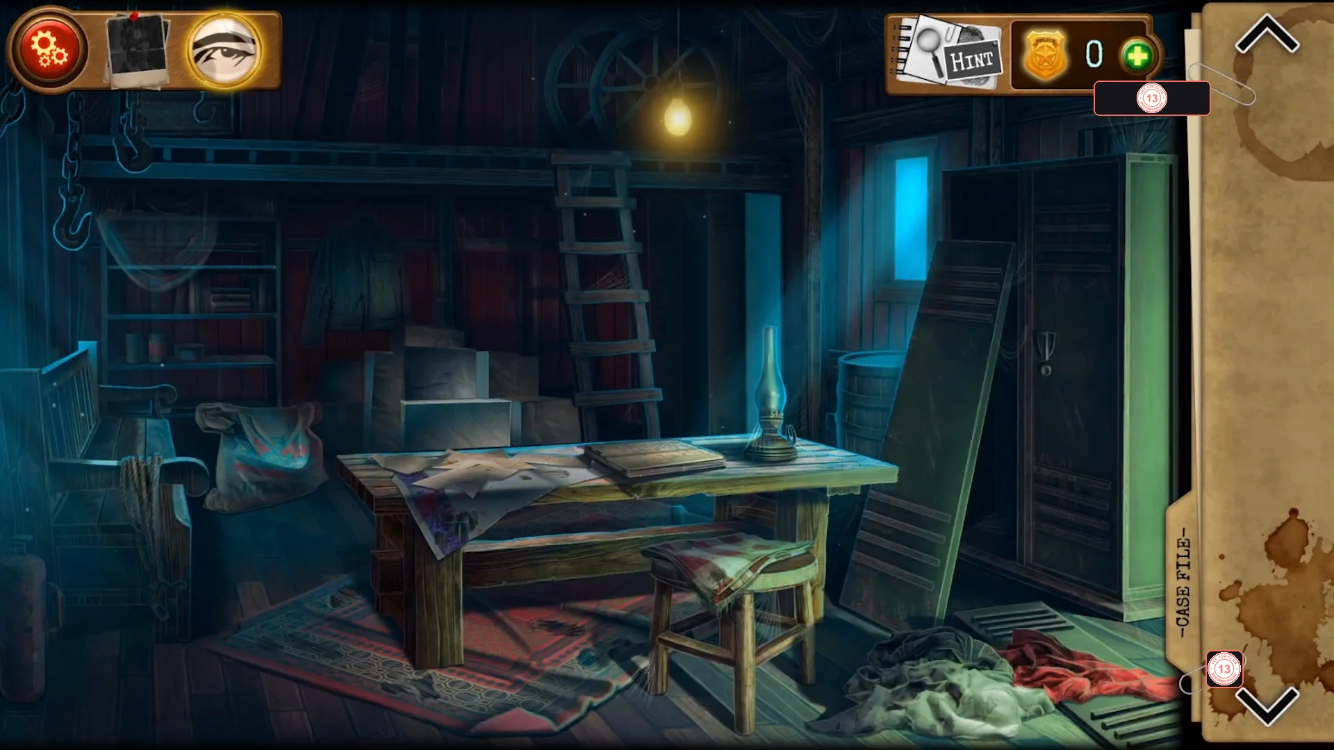 Dim fisherman's cabin with a cluttered workbench on the left, a wooden table with a diary and an oil lamp in the middle, a ladder, cardboard boxes and a tall green locker on the right