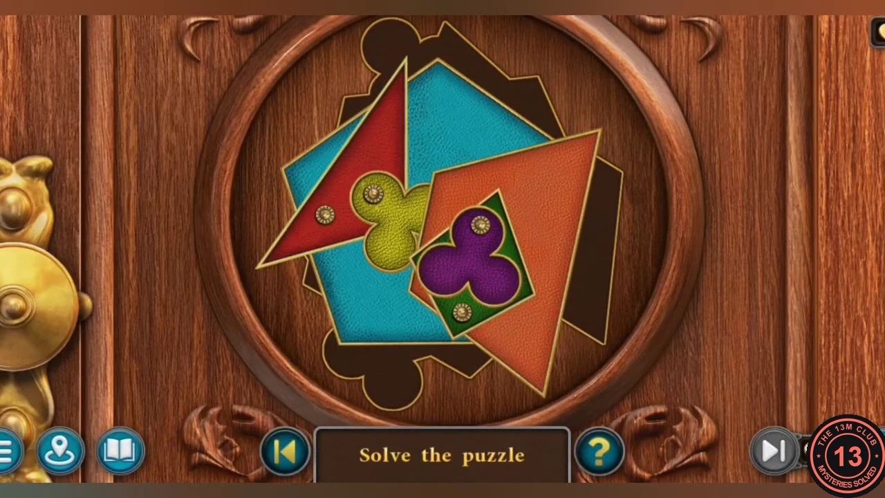 Green pharmacy cabinet shape puzzle: orange, blue, red and green pieces with purple and yellow clovers, scattered over a dark recess in a round frame