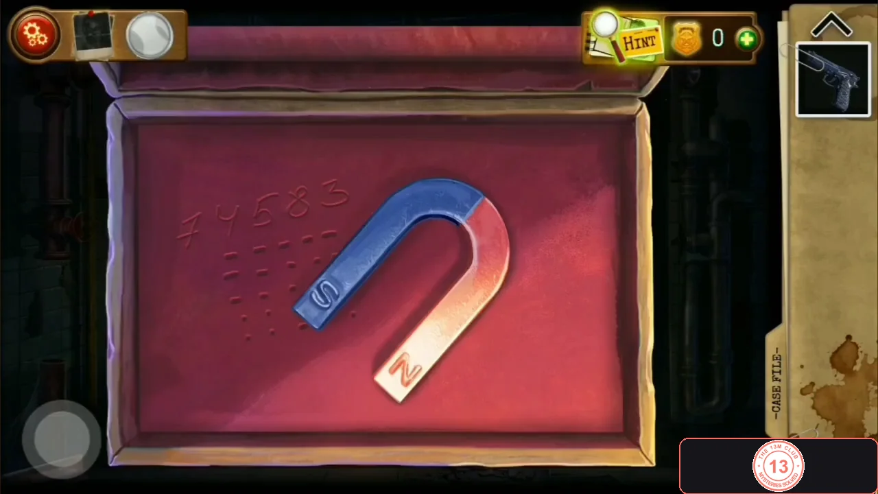 Open box lined with red fabric holding a horseshoe magnet, with 74583 and rows of dashes scratched into the lid
