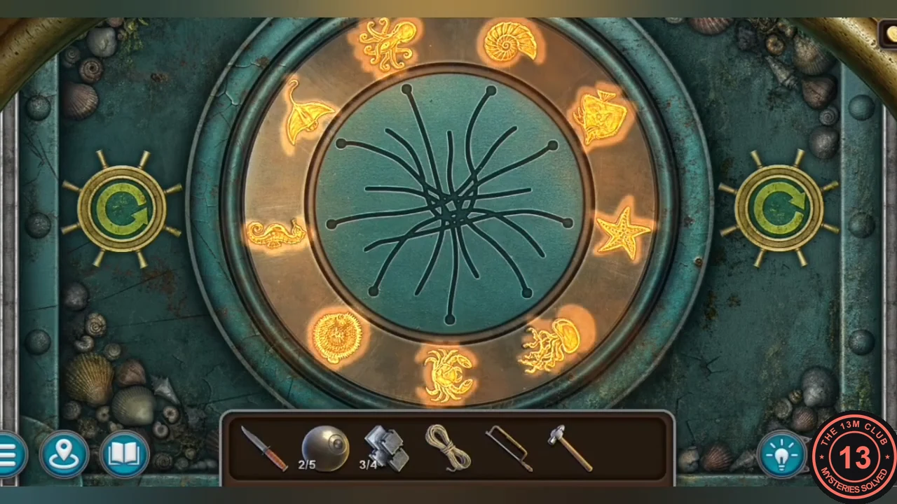 Solved sea-creature door with all nine gold creatures glowing on the outer ring