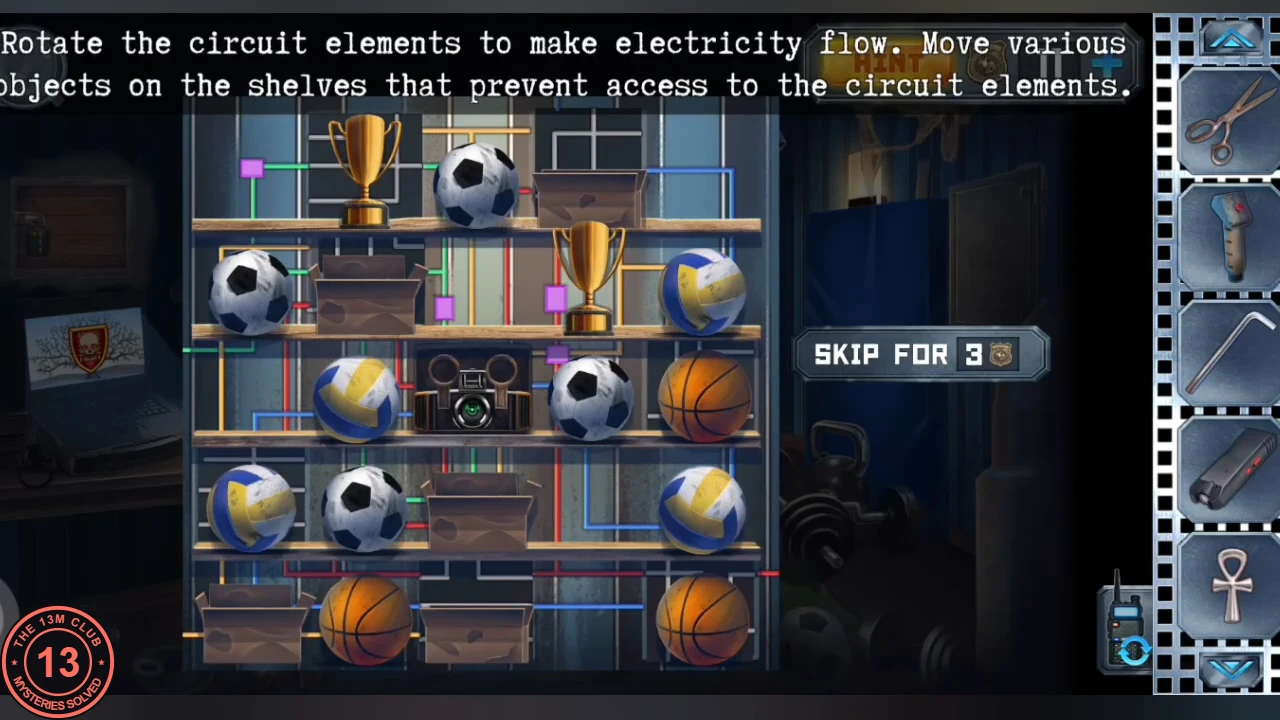 Locker cabinet shelves filled with balls, trophies and boxes covering circuit wiring behind them, with a camera device in the middle and the instruction text at the top