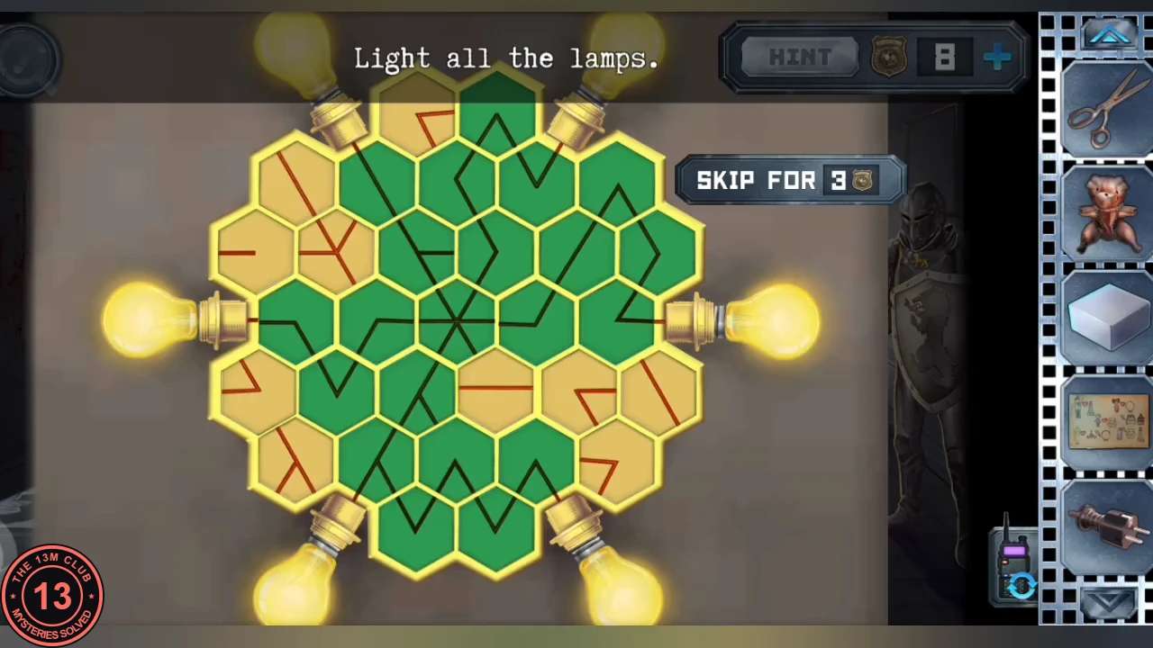 The hexagon board with a connected path of green tiles reaching all six bulbs, every bulb lit