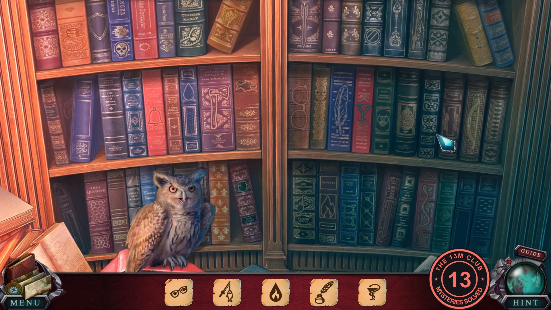 Bookshelf with the symbol bar at the bottom and the owl statue