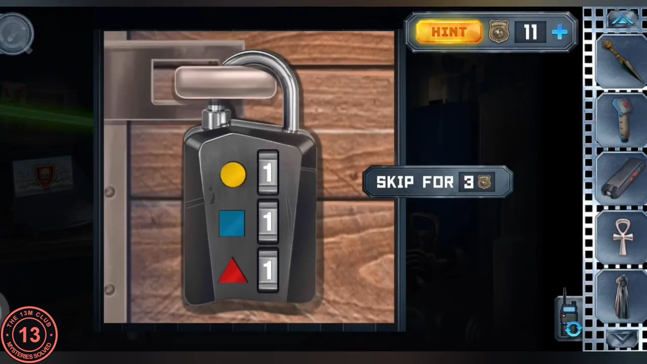 Crate padlock with three number wheels beside a yellow circle, a blue square and a red triangle, all set to 1