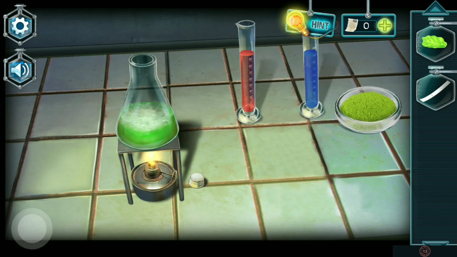 Laboratory bench with a green liquid flask on a burner, red and blue measuring cylinders and a dish of green powder