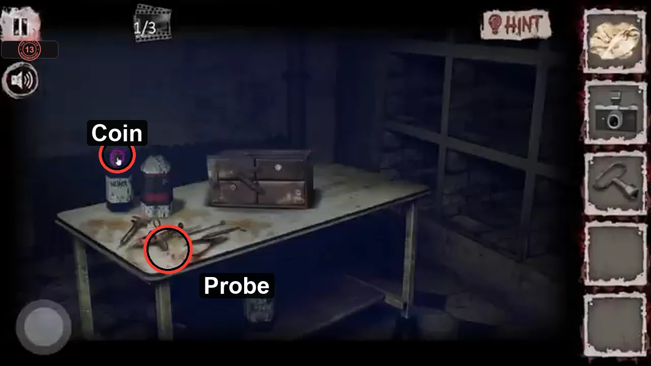 Instrument table with the coin on the left bottle and the long probe among the instruments circled