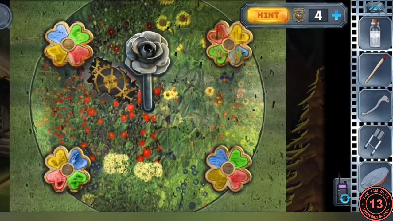 The flower lever in the clearing in its starting layout: four four-petal flowers with blue, green, yellow and red petals around the golden gear and the rose lever.