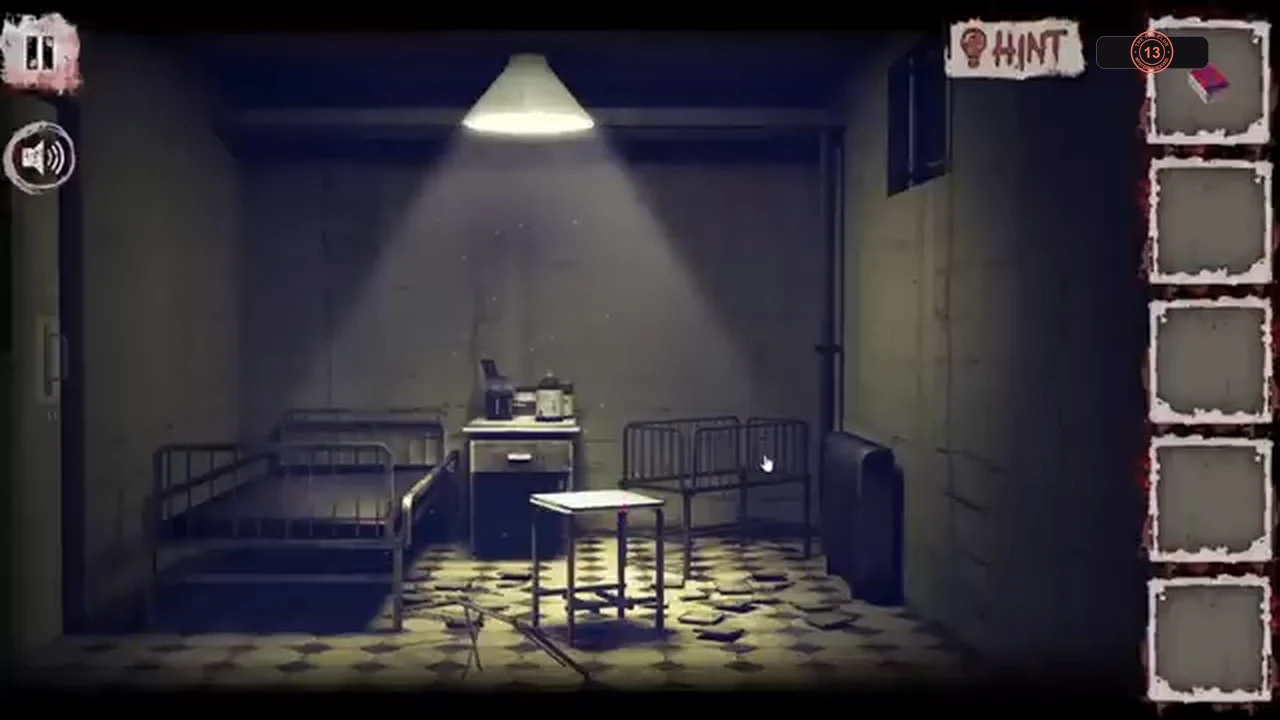 The locked starting ward with two beds, a nightstand between them and a lamp overhead