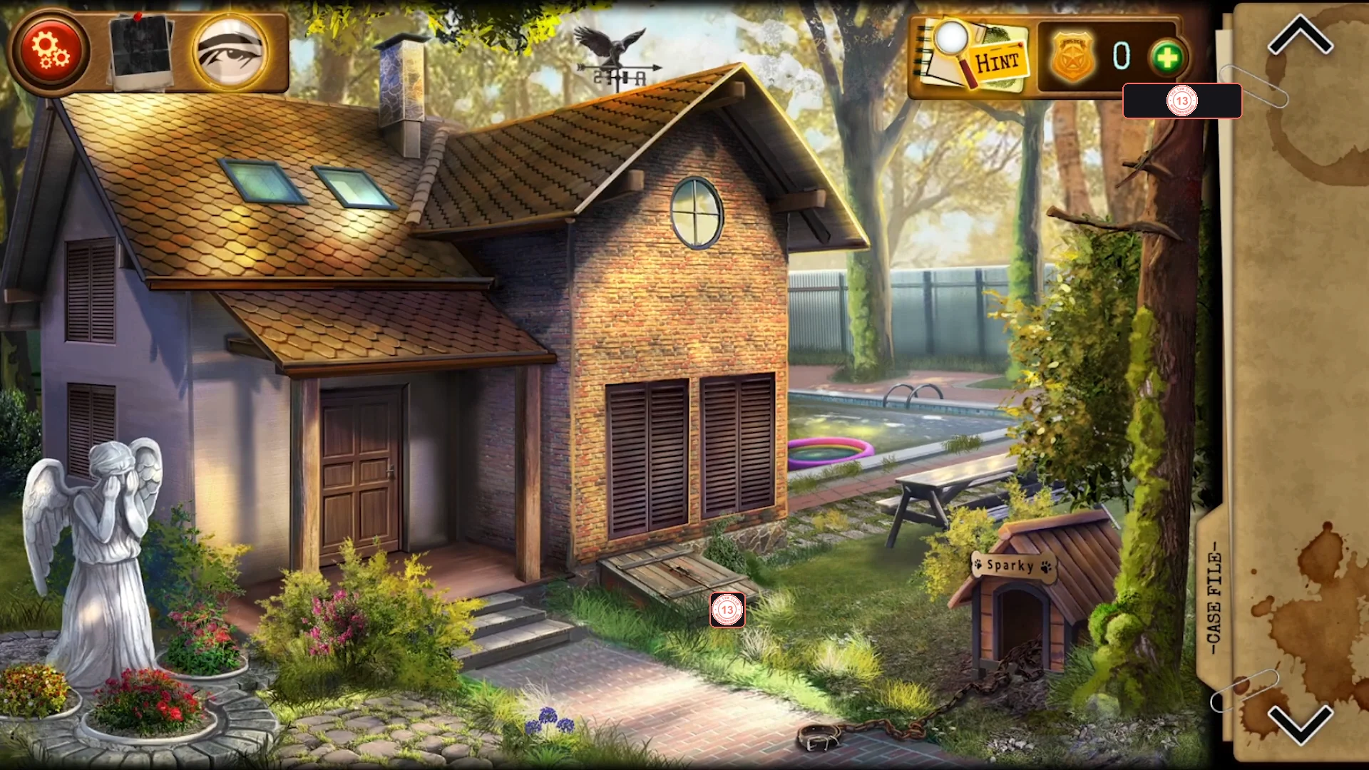 Sunny yard of a brick country house with a weeping angel statue on the left, the front door in the middle, a doghouse labelled Sparky on the right and an overgrown pool behind
