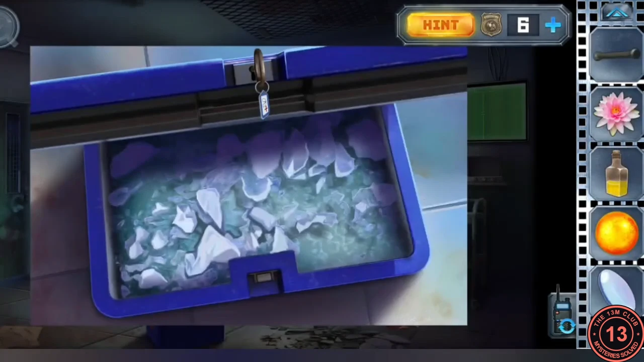 The open blue cool box in the hospital room filled with frozen ice chunks, before the burning ball is dropped in