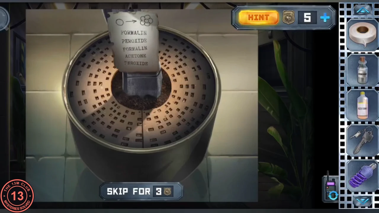 Flower pot with soil and a metal stem, the 'How to grow a flower' label on it reading FORMALIN, PEROXIDE, FORMALIN, ACETONE, PEROXIDE