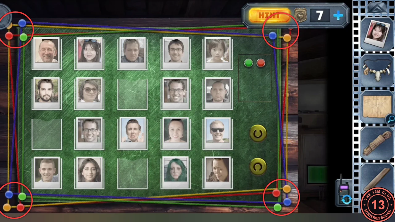 Cabin photo wall of portraits framed by red, yellow, green and blue strings, with coloured pins at each corner circled