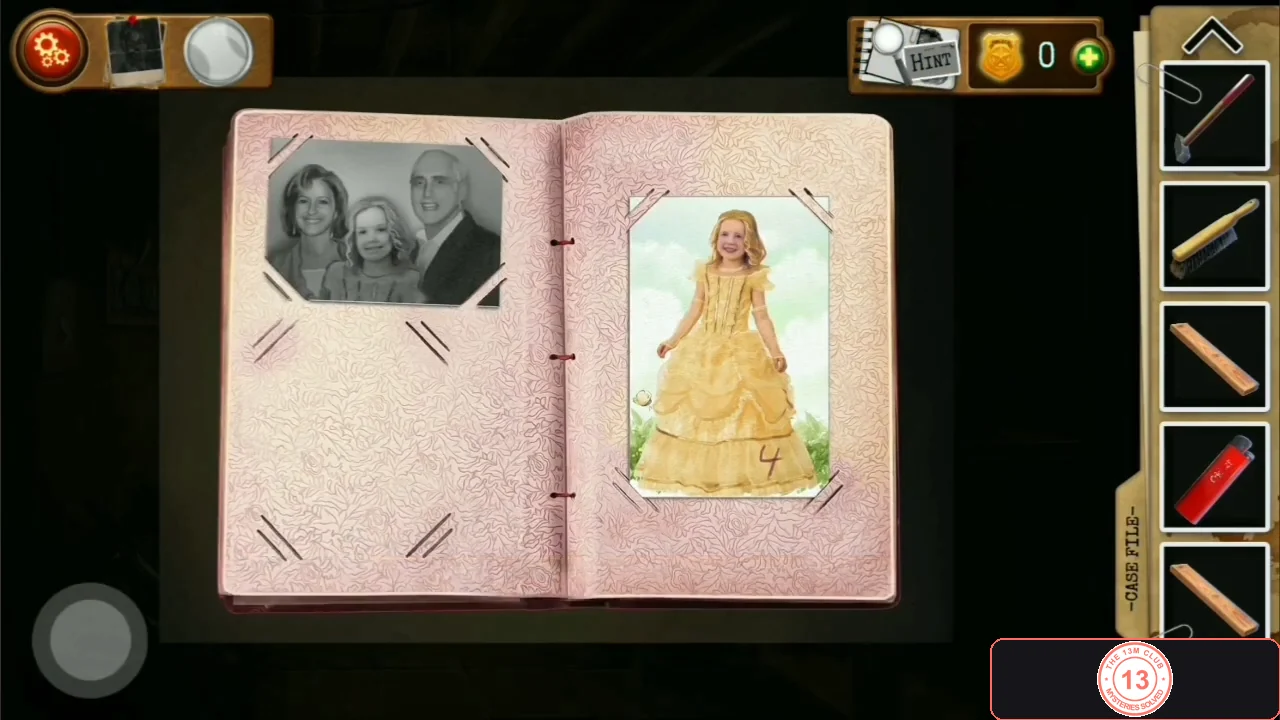 Open photo album with a family photo and a photo of a girl in a yellow princess dress marked with the number 4